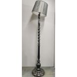 A black painted, barley twist standard lamp and shade, total H. 178cm.