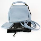A pale blue leather Lulu Guinness handbag and cover, W. 28cm.