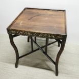 A folding Chinese hardwood side table with surrounding mother of pearl floral decoration, 54 x 47