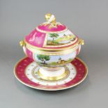 A continental hand painted porcelain soup tureen with cover and stand, stand dia. 38cm. Minor chip