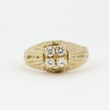 A yellow metal (tested minimum 9ct gold) ring set with brilliant cut diamonds, engraved 12kt (N.5).
