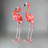 A pair of painted metal garden figures of flamingos, H. 70cm.