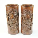 A pair of large Chinese carved bamboo brush pots, H. 28cm.