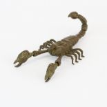 An articulated Japanese bronze model of a scorpion, L. 9cm.