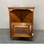 A Victorian carved mahogany corner wall cupboard, H. 60cm.