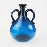 A large 19th Century blue soda glass flagon, H. 31cm.