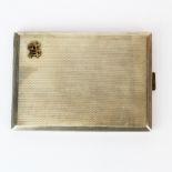 An Art Deco white metal cigarette case (tested silver) with yellow metal monogram, 10.7 x 7.5 x 0.