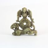 A Chinese archaic form carved jade amulet, H. 7cm.