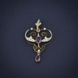 A 9ct yellow gold Art Nouveau pendant set with tourmalines and seed pearls, L. 4cm.