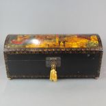 A lacquered wooden trunk, W. 51cm.