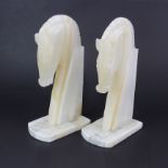 A pair of large 1960's horse head onyx book ends, H. 27cm. One slightly A/F.