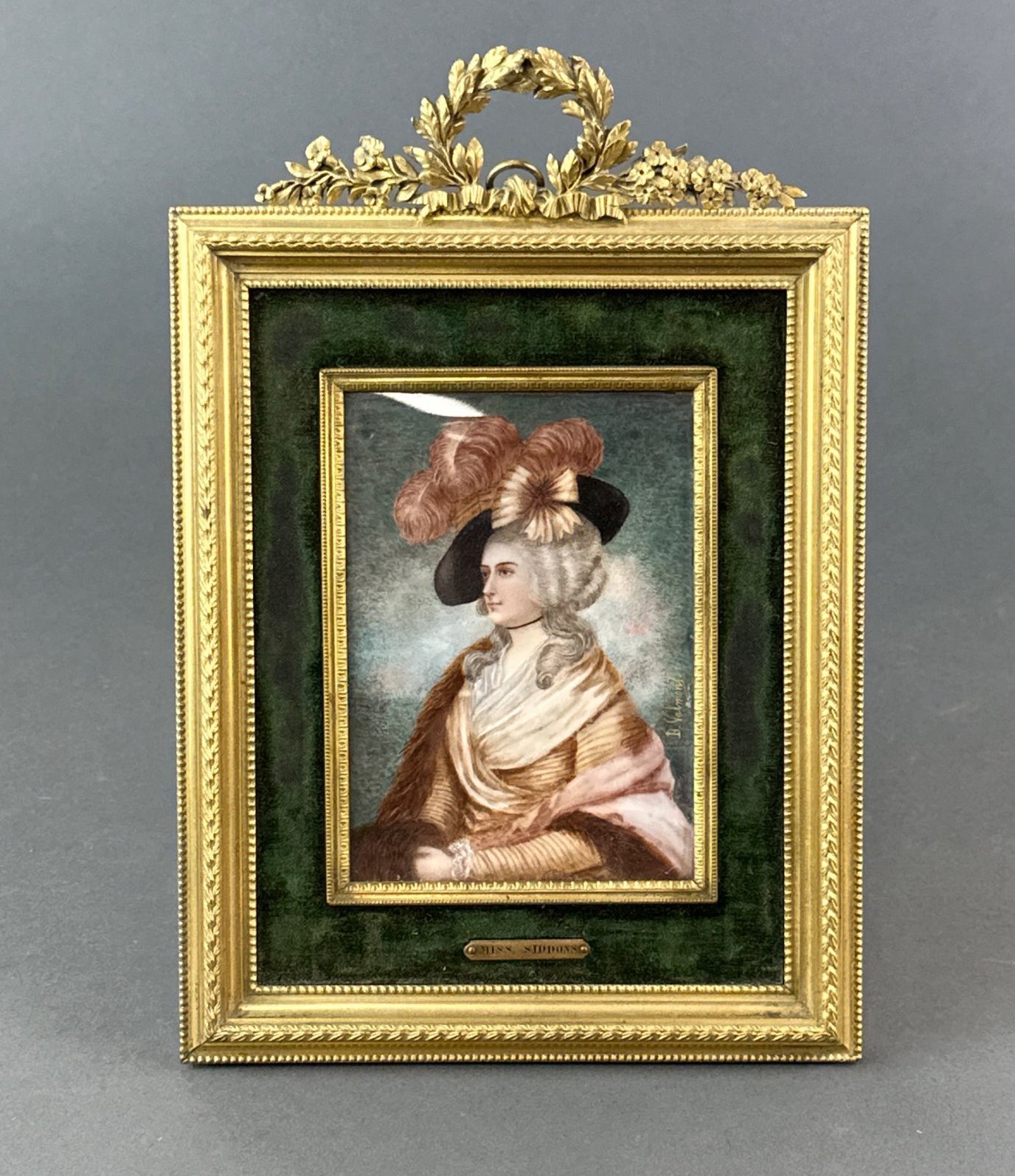 An early 20th century gilt framed hand painted miniature of Miss Siddons signed Valmont, frame