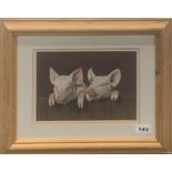 A framed pastel of two piglets signed E. Ramsey, frame size 43 x 35cm.