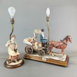 A large resin carriage and horse table lamp on a wooden base together with a further figural table