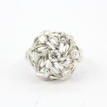 A large 18ct white gold ring set with brilliant cut diamonds, estimated approx. 0.6ct total, (M).