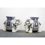 A pair of Chinese ceramic elephant garden stools, H. 41cm.
