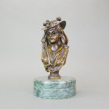 A cast bronze bust of a girl on a green polished marble base, H. 26cm.
