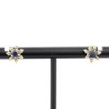 A pair of 9ct yellow gold sapphire and diamond stud earrings, L. 0.8cm.