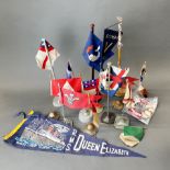 A box of vintage shipping line flags and other items.