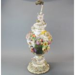 A large 19th Century Meissen porcelain jar and lid later mounted as a table lamp base, in need of