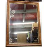 A large attractive bevelled glass mirror, 90 x 122cm.