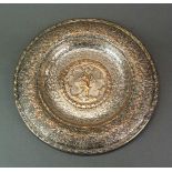 A 19th Century silvered hammered copper Elkington alms style dish with label and stamped no. 797,