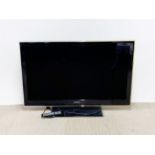 A large 46" Samsung flat screen television.