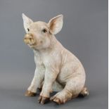 A detailed resin figure of a piglet, H. 46cm.