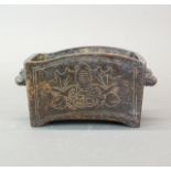 A Chinese bronze censer with incised decorated of a bat and peaches, w.19cm.