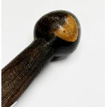 An African carved ebony walking stick, L. 99cm.