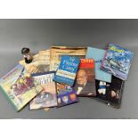 A quantity of Sir Winston Churchill books and related items.