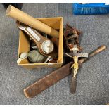 A cricket bat and various other items.