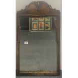 A regency gilt walnut framed wall mirror, 46 x 79cm.