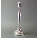 A large hallmarked silver candlestick, H. 31cm.