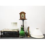 A group of table lamps, shades and other items.