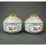 A pair of Continental porcelain potpourri bowls and covers, H. 16cm. Dia. 16cm.