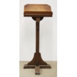 A large oak ecclesiastical lectern, H. 138cm.