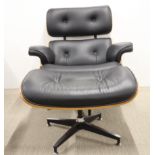 An Eames style armchair and footstool.