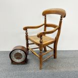 A 19th Century cane seated child's potty chair with hinged seat, H. 62cm. Together with an oak