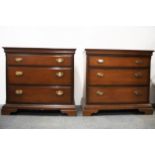 A pair of Stagg three drawer chests, W. 81cm.