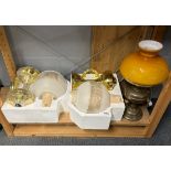 Four vintage style oil lamps, two boxed.