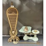 A brass fan fire screen, toasting fork and enamelled scale.