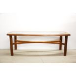 A heavy quality 1970's teak and glass coffee table, L. 123cm, H. 43cm.