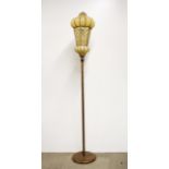 An interesting copper standard lamp with metal and glass Eastern style shade, H. 176cm.