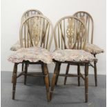 Two pairs of beechwood kitchen chairs.