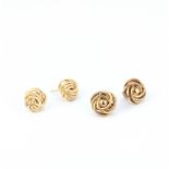 A pair of 9ct yellow gold stud earrings together with a pair of yellow metal stud earrings (with 9ct