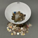 A bowl of mixed coins.