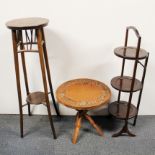 An unusual Arts and Crafts bentwood plant stand with a carved Eastern side table and a folding