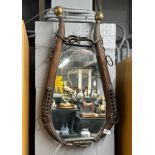 An antique working horse harness mirror, H. 70cm.