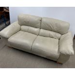 A cream leather three seater settee, L. 185cm.